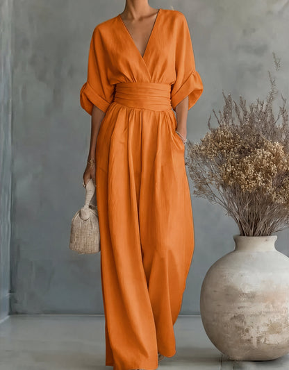 Mono elegante de escote en V y pierna ancha